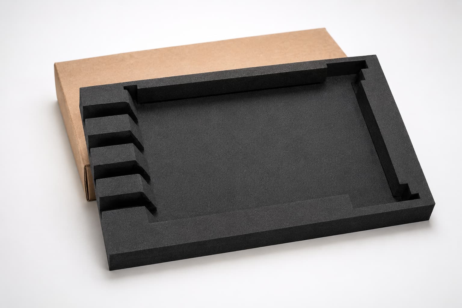 Black cardboard insert in a rigid box for premium product protection